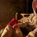 Portrait of a friendly AI chatbot assistant Camping trip with expressive eyes showcasing personality traits