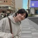 Minimalist Yang Jeongin avatar for google chat integration, featuring adaptive emotional expressions