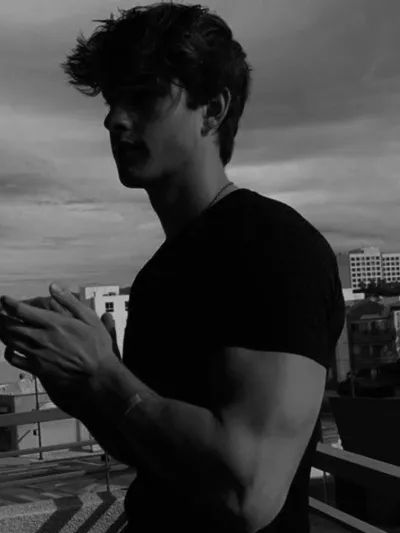 AI anime chat role Asher has a charming look and a captivating background story.