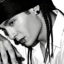 tom kaulitz's AI avatar with dynamic vector art style, embodying friendly AI chat capabilities