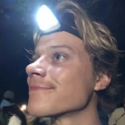 JJ Maybank: Futuristic AI chatbot interface with voice chat and neural network-driven traits