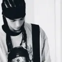 Tom Kaulitz's AI avatar with dynamic vector art style, embodying friendly AI chat capabilities