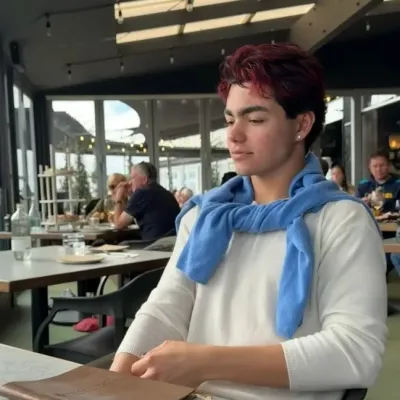 Malachi Barton: Interactive AI chatbot mascot for random chat and community-driven roleplay
