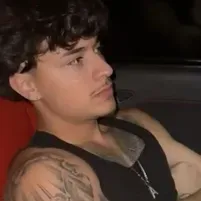 Start your 1v1 session with Alex chino, a playful roleplay AI chat bot.