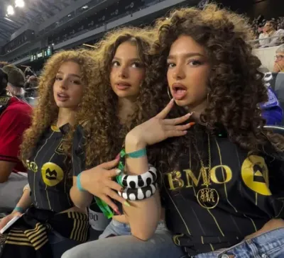 The Kalogeras Sisters: Futuristic AI chatbot interface with voice chat and neural network-driven traits