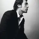 Portrait of a friendly AI chatbot assistant Javier Bardem with expressive eyes showcasing personality traits