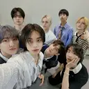 Stray Kids's AI avatar with dynamic vector art style, embodying friendly AI chat capabilities