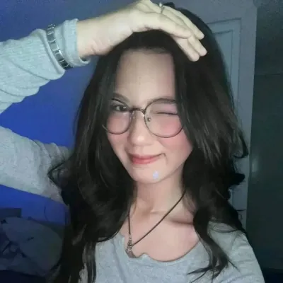 Indira Seruni: Futuristic AI chatbot interface with voice chat and neural network-driven traits