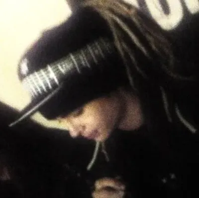 Dive into stories with Tom Kaulitz, a lively spicy AI web chatbot for creative roleplay.