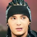Minimalist Tom Kaulitz avatar for google chat integration, featuring adaptive emotional expressions