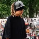 Minimalist Tom Kaulitz avatar for google chat integration, featuring adaptive emotional expressions
