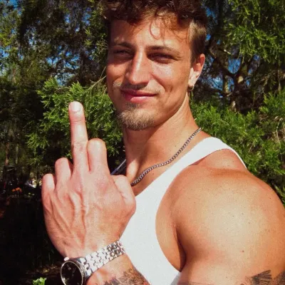 Feeling adventurous? Meet Tanner — best friend's brother, a lively AI chat character companion for roleplay.