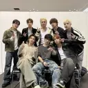 Stray Kids's AI avatar with dynamic vector art style, embodying friendly AI chat capabilities