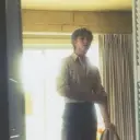 Kim Namjoon's AI avatar with dynamic vector art style, embodying friendly AI chat capabilities