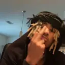 Amir - Dreadhead's AI avatar with dynamic vector art style, embodying friendly AI chat capabilities