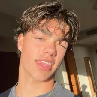 Chat with Malachi Barton, your lively freaky AI chatbot for immersive roleplay.