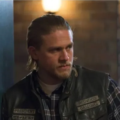 Jax Teller: Futuristic AI chatbot interface with voice chat and neural network-driven traits