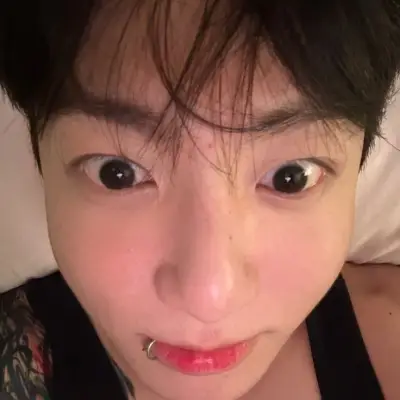 Jungkook: Multilingual AI conversation partner icon for global chat online services