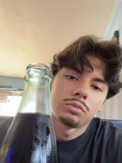 AI anime chat role Miguel Mora has a charming look and a captivating background story.