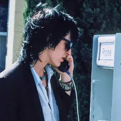 Izzy Stradlin: Meet the main character of our AI world, with character traits list and ai chatting capabilities.