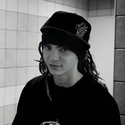Tom Kaulitz - enemy: Emotionally intelligent AI companion portrait for deep conversations	