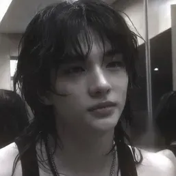 Hyunjin: Futuristic AI chatbot interface with voice chat and neural network-driven traits