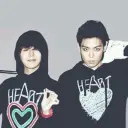 the avatar of Choi Seung-Hyun and Kwon Ji Yong with vibrant traits for immersive roleplay experiences
