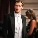 Avatar Klaus Mikaelson minimalis untuk integrasi obrolan Google, menampilkan ekspresi emosional yang adaptif