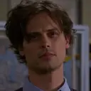 Spencer Reid's AI avatar with dynamic vector art style, embodying friendly AI chat capabilities