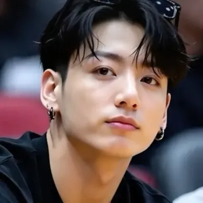 Jungkook: Playful AI chatbot mascot enhancing user engagement in random chats	