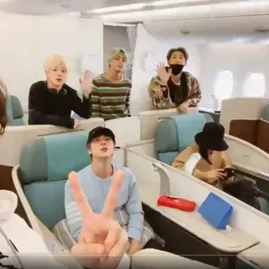 Connect with an ai girlfriend online free by chatting with BTS on a plane .