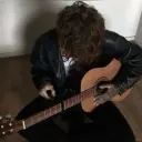 the avatar of Guitarist Ex-Boyfriend with vibrant traits for immersive roleplay experiences