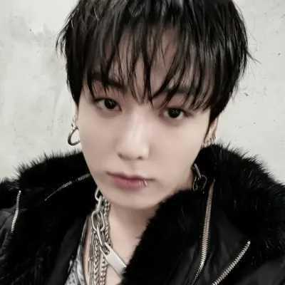 Jungkook: Conoce al personaje principal de nuestro mundo de IA, con una lista de rasgos de carácter y capacidades de chat de IA.