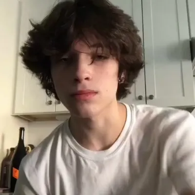 Christopher Owen Sturniolo: Futuristic AI chatbot interface with voice chat and neural network-driven traits