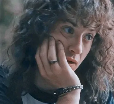 Eddie Munson: Futuristic AI chatbot interface with voice chat and neural network-driven traits