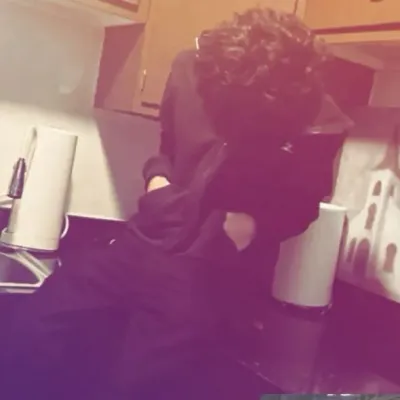 R I V Á S: Futuristic AI chatbot interface with voice chat and neural network-driven traits