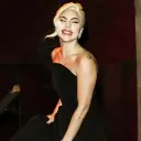 Portrait of a friendly AI chatbot assistant Lady Gaga with expressive eyes showcasing personality traits