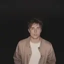 Portrait of a friendly AI chatbot assistant SAM FENDER with expressive eyes showcasing personality traits